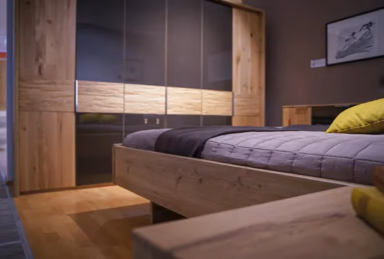 Lattoflex Matratze in gemütlichem Holzbett