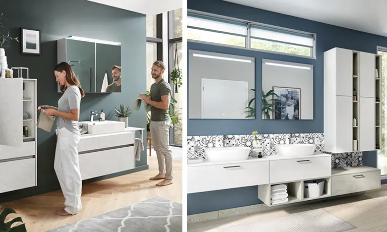 Frau und Mann im modernen Badezimmer mit grüner Wand und weißen Badmöbeln mit Spiegelschrank; helles freundliches Badezimmer in Weiß und Blau, modernes Badezimmer mit Spiegelschrank