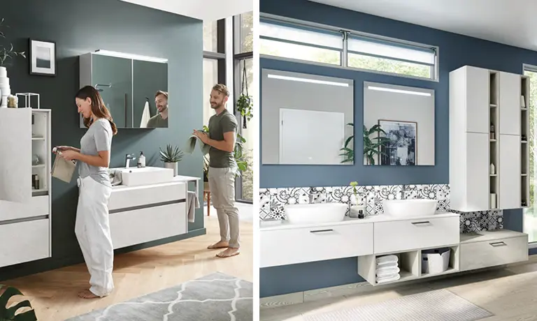 Frau und Mann im modernen Badezimmer mit grüner Wand und weißen Badmöbeln mit Spiegelschrank; helles freundliches Badezimmer in Weiß und Blau, modernes Badezimmer mit Spiegelschrank