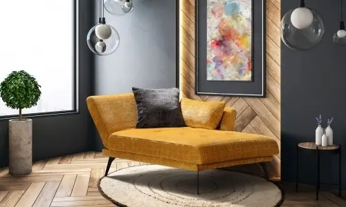 Einzelliege in gelb mit schwarzen Füßen