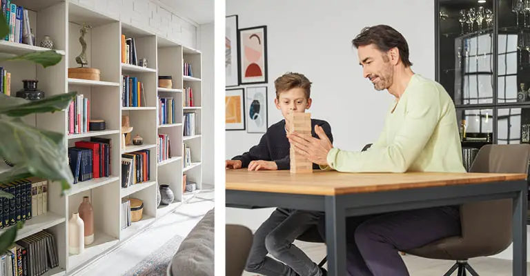 Vater und Son beim gemütlichen Spielenachittag am Esstisch.