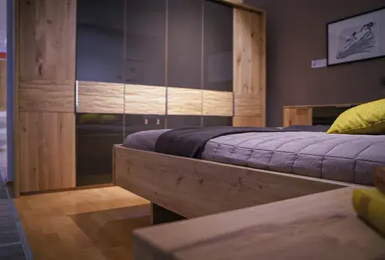 Lattoflex Matratze in gemütlichem Holzbett