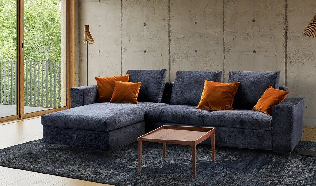 dunkelblaue Wohnlandschaft in stylischer Optik