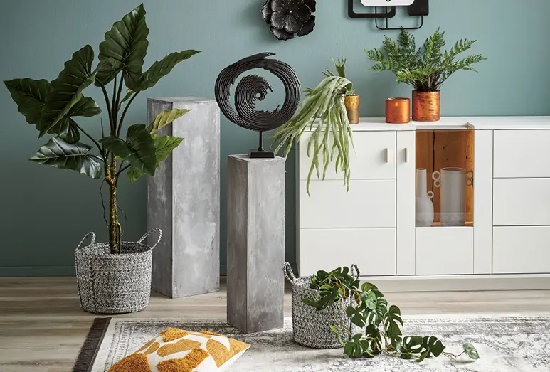 Pflanzen im Schlafzimmer sorgen für ein gutes Raumklima. Ideen finden Sie bei Möbel Maier.