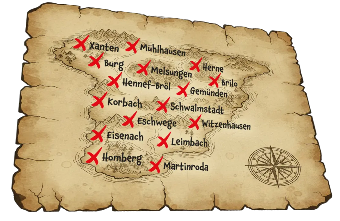 Illustrierte Schatzkarte auf Pergament mit Ortsnamen wie Xanten, Kassel, Eisenach und Bad Langensalza, vielen roten Kreuzen und Windrose unten rechts.