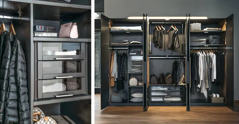 Das Innenleben des Schranks besteht aus Schubladen, Kleiderstangen, Ablageflächen, verschiedenen Fächern und vielem mehr.