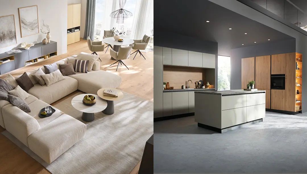 Wohnzimmer mit Sofa, Couchtischen und Essplatz, daneben moderne Küche