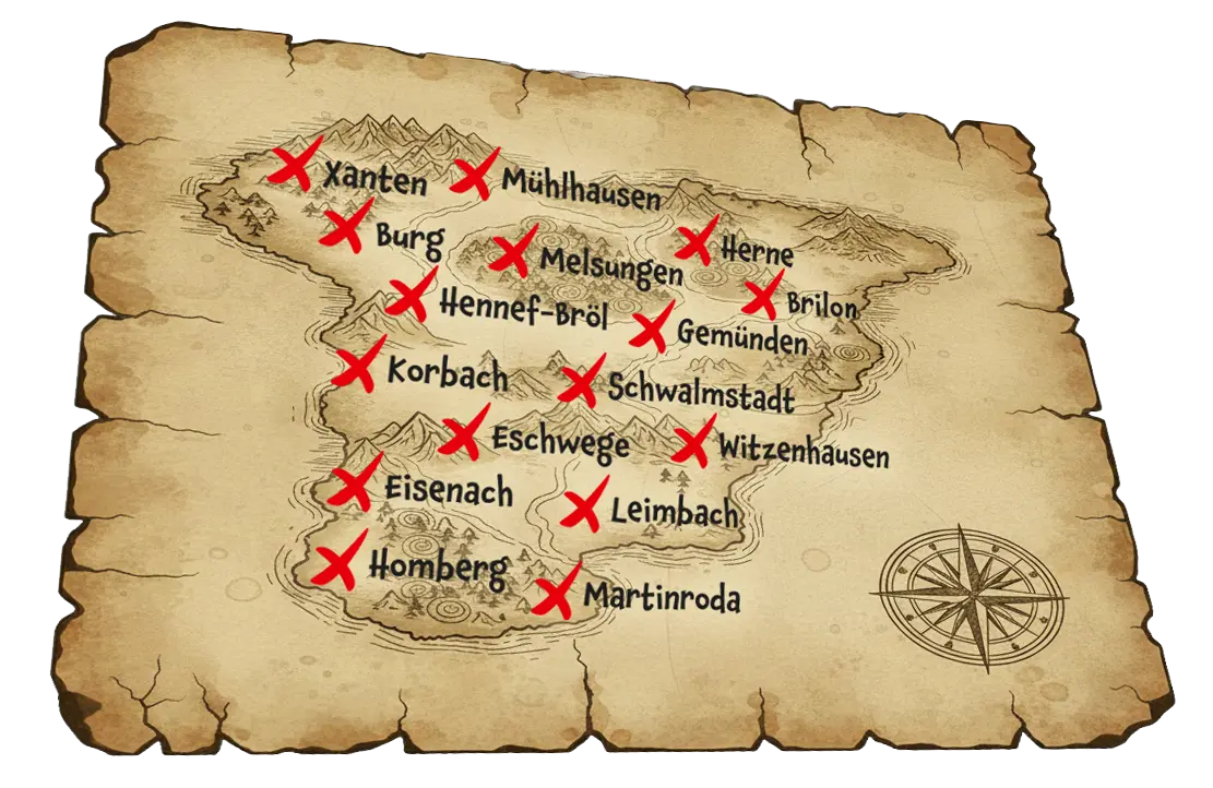 Illustrierte Schatzkarte auf Pergament mit Ortsnamen wie Xanten, Kassel, Eisenach und Bad Langensalza, vielen roten Kreuzen und Windrose unten rechts.
