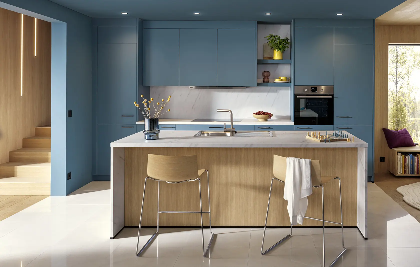 Moderne Blaue Inselkueche mit Einbaugeraeten