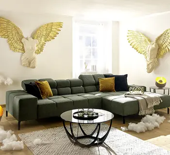 Stylisches Grünes Sofa in Wohnzimmer