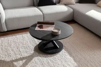 Moderner Runder Couchtisch mit schwarzer Keramikoberfläche.