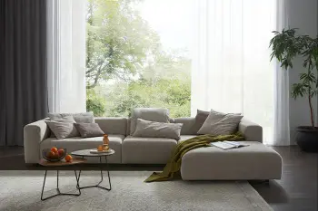 Contur_wohnen_im_Stadthaus_beiges_Ecksofa.webp