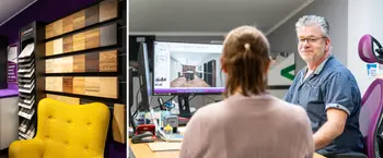 Beratungsgespraech mit Kundin mit Praesentation von 3D-Kuechenmodell.