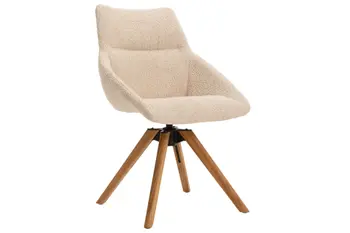 Schalenstuhl in cremefarbenem Bouclestoff mit Gestell in hellem Holz.