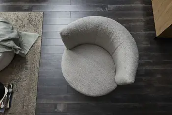 Grauer runder Sessel mit Boucle Bezug von oben.