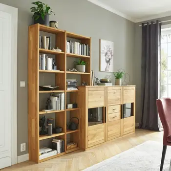 Eine Holzwohnwand mit Highboard und Regal.