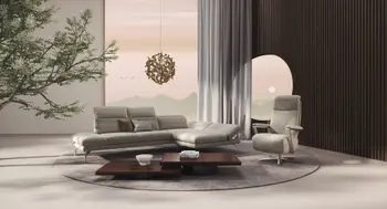 Relaxsessel Enno mit silbernen Armlehnen und taupefarbenem Stoffbezug