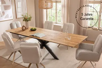 Schönes Esszimmer mit langem hölzernen Esstisch und 6 Stühlen sowie einem Vermerk zur Garantie. 