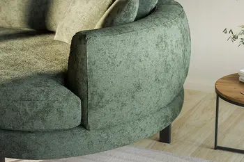 Detailbild von grüne Stoffsofa mit rundem Abschlusselement. 