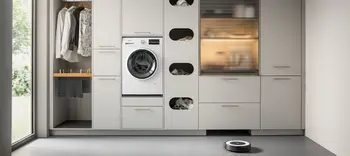 Hauswirtschaftsraum mit Staubsaugerrobotergarage