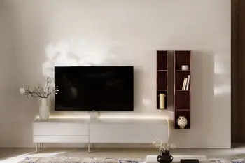 Moderne Wohnwand bestehend aus einem weißen TV-Lowboard und einem braunen hängenden Wandregal.