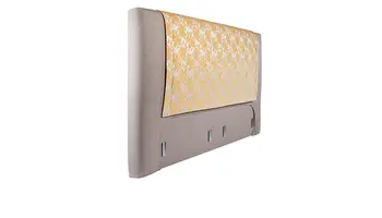 Polsterbett-Kopfteil mit goldener Zierauflage