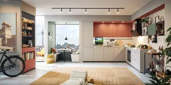 Helle Winkelkueche mit orangefarbenen Akzenten.