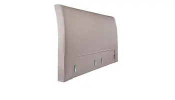 Detailaufnahme eines gepolsterten Betthaupts in Beige